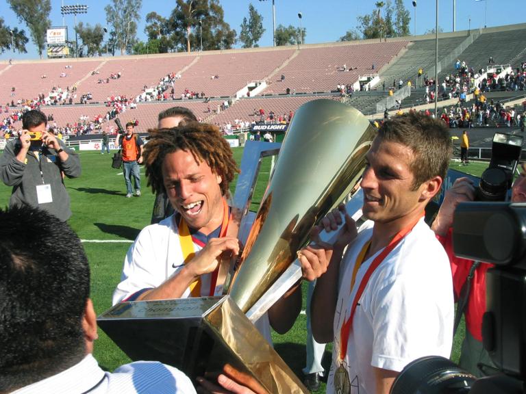 2 Feb 2002:  Cobi Jones (l) and Frankie Hejduk of the USA tour the field with the first place trophy after their CONCACAF Gold Cup Championship match at the Rose Bowl in Pasadena, California. The USA defeated Costa Rica 2-0. DIGITAL IMAGE  Mandatory Credit: Stephen Dunn/Allsport