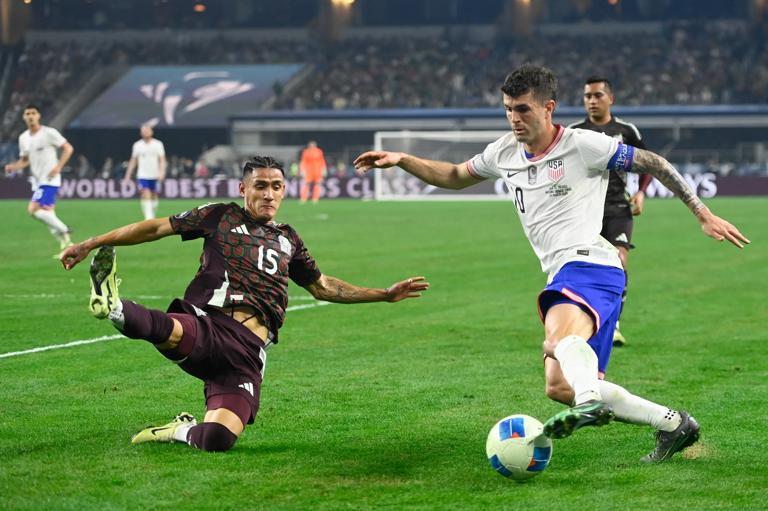 ARLINGTON, TEXAS - MARCH 24: Christian Pulisic of the United States drives the ball during the Concacaf Nations League final match between Mexico and USMNT at AT&T Stadium on March 24, 2024 in Arlington, Texas. (Photo by Click Thompson/Getty Images)